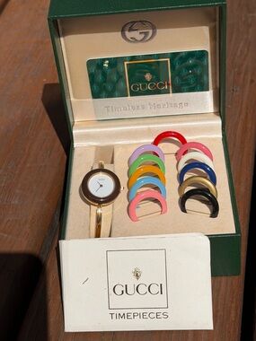 Gucci Gold Bracelet Watch with Multicolor Interchangeable Bezels